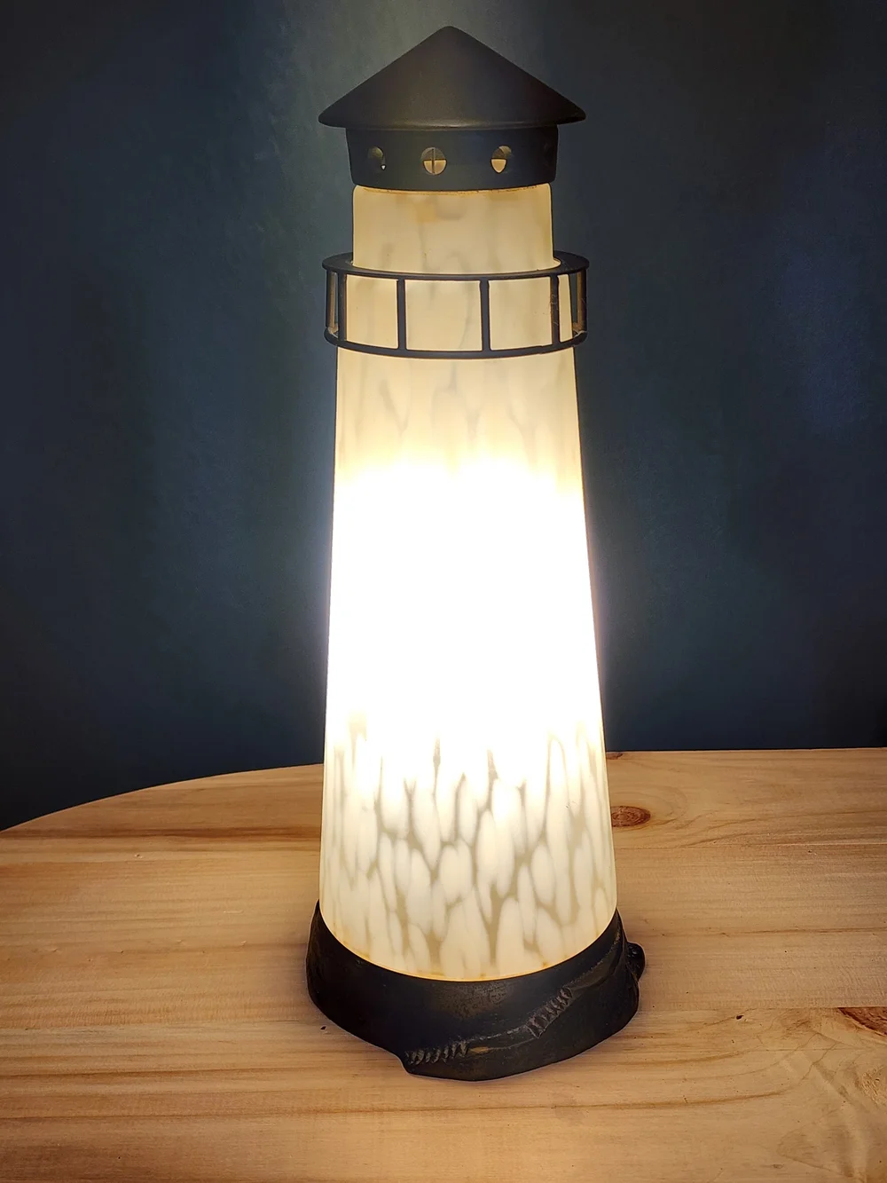 Vintage Frosted Art Glass Lighthouse Lamp with a brass-colored base